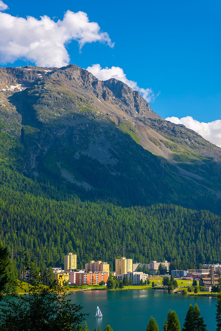 Panoramic View over City and Lake in Mountain Valley with Blue Sky and Clouds in a Sunny Summer Day in St. Moritz, Grisons, Switzerland.