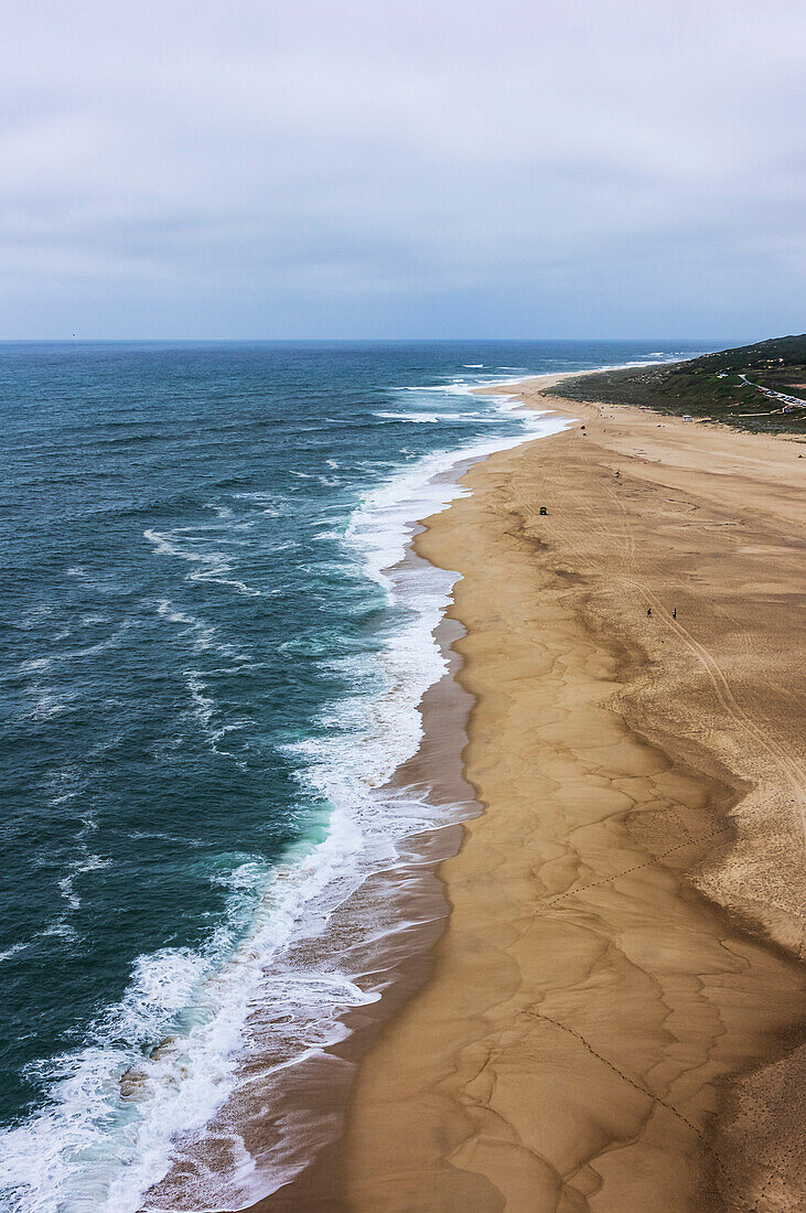  Nazaré is a Portuguese city located on the Atlantic Ocean in the Oeste subregion of the Centro region and the historical province of Estremadura, about 100 km north of Lisbon, here the view of the windy surfing north beach. 