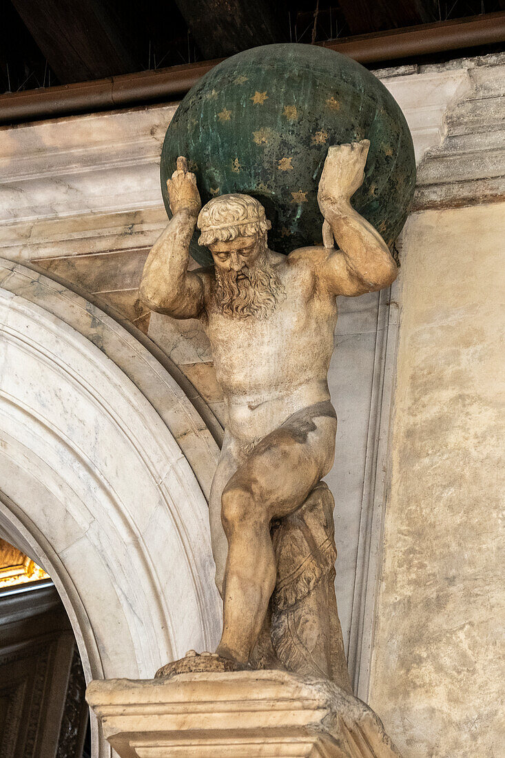 Statue of Atlas carrying the world at Palazzo Ducale, Venice, Italy.