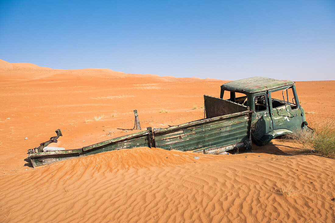 Abandoned and stuck in The Sharqiya Sands, formerly known as Wahiba Sands, region of desert in Sultanate of Oman, Arabian Peninsula, Middle East