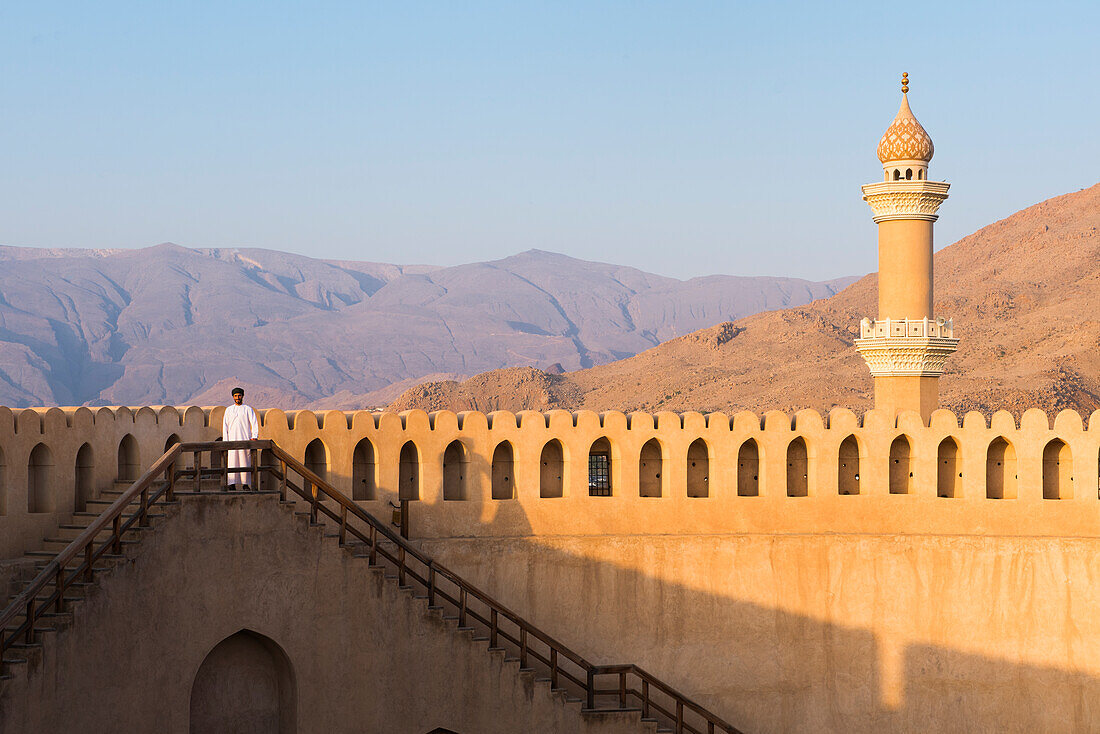 Abdullah, guide of the Museum, posing at Nizwa Fort, Ad Dakhiliyah Region, Sultanate of Oman, Arabian Peninsula, Middle East