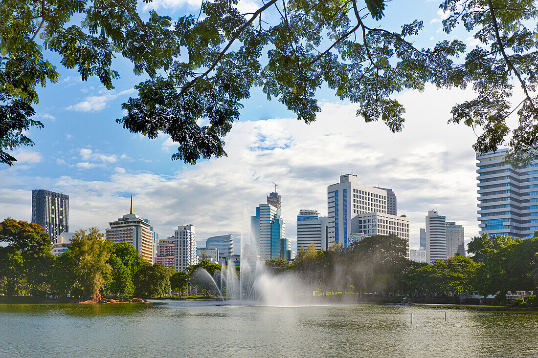 Modern high-rise buildings at Lumphini Park in Bangkok, Thailand.