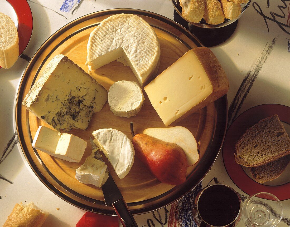 Assorted Cheese on a Round Cutting Board