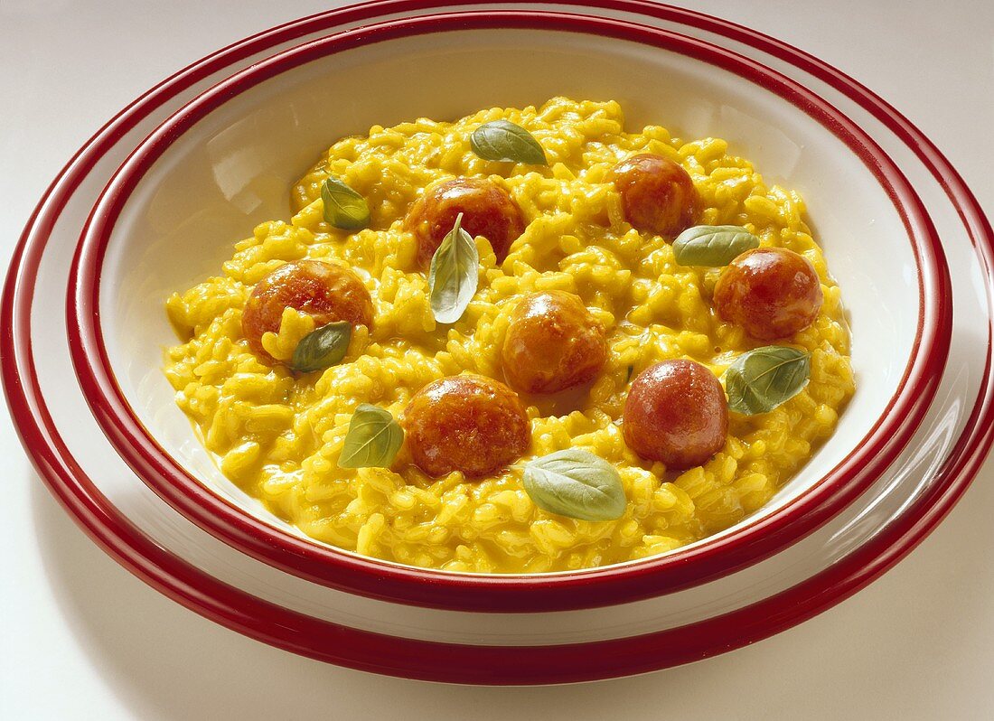 Risotto alla milanese with cherry tomatoes (Italy)