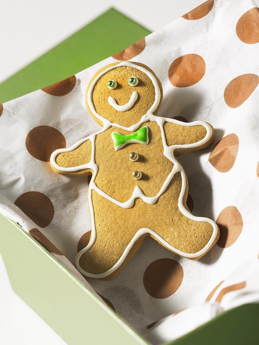 A gingerbread man in a box