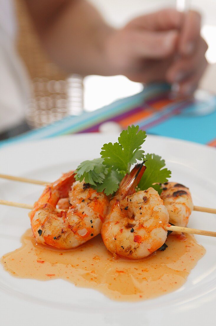 Prawn skewers with chilli sauce