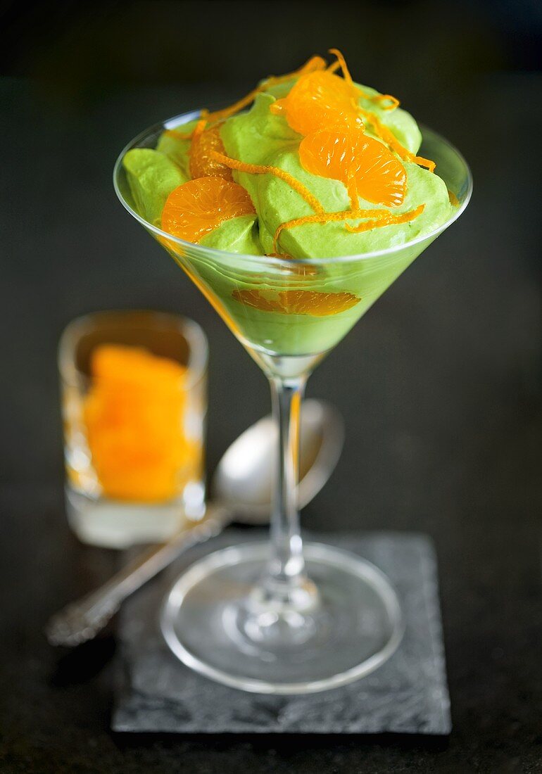 Matcha (green tea) cream with mandarin oranges and orange zest