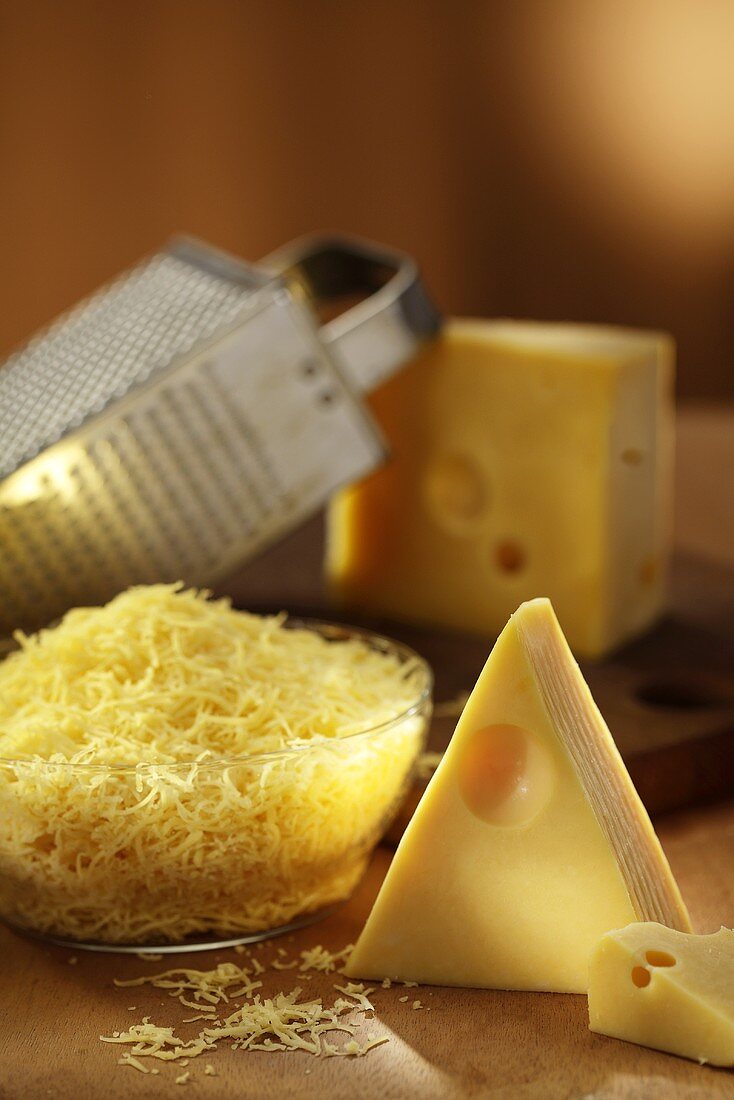 Emmental cheese, whole and grated