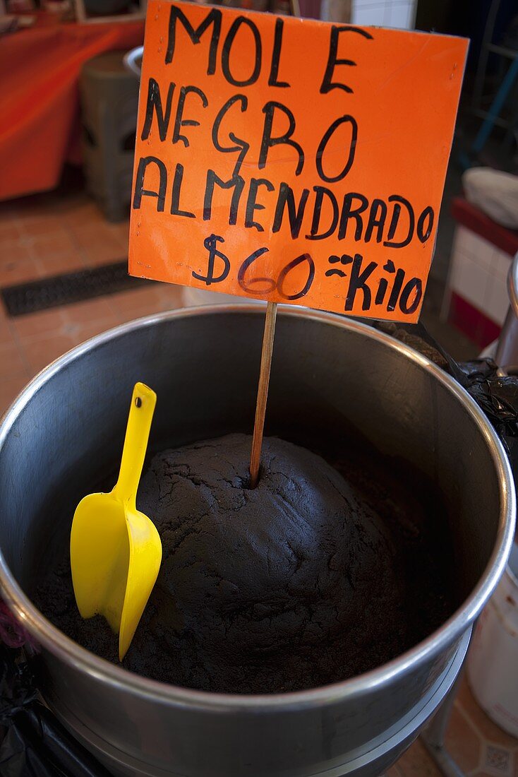 Mole negro almendrados (Mexican almond sauce) at a market