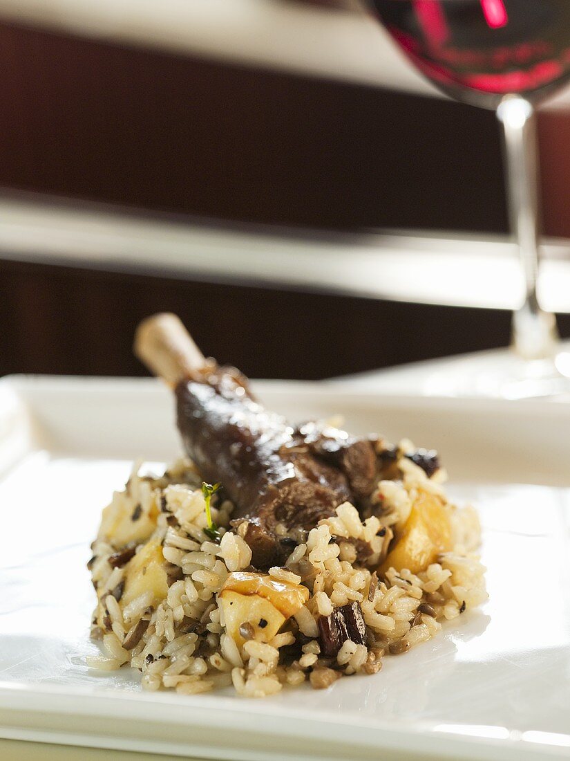 A leg of lamb on a bed of risotto