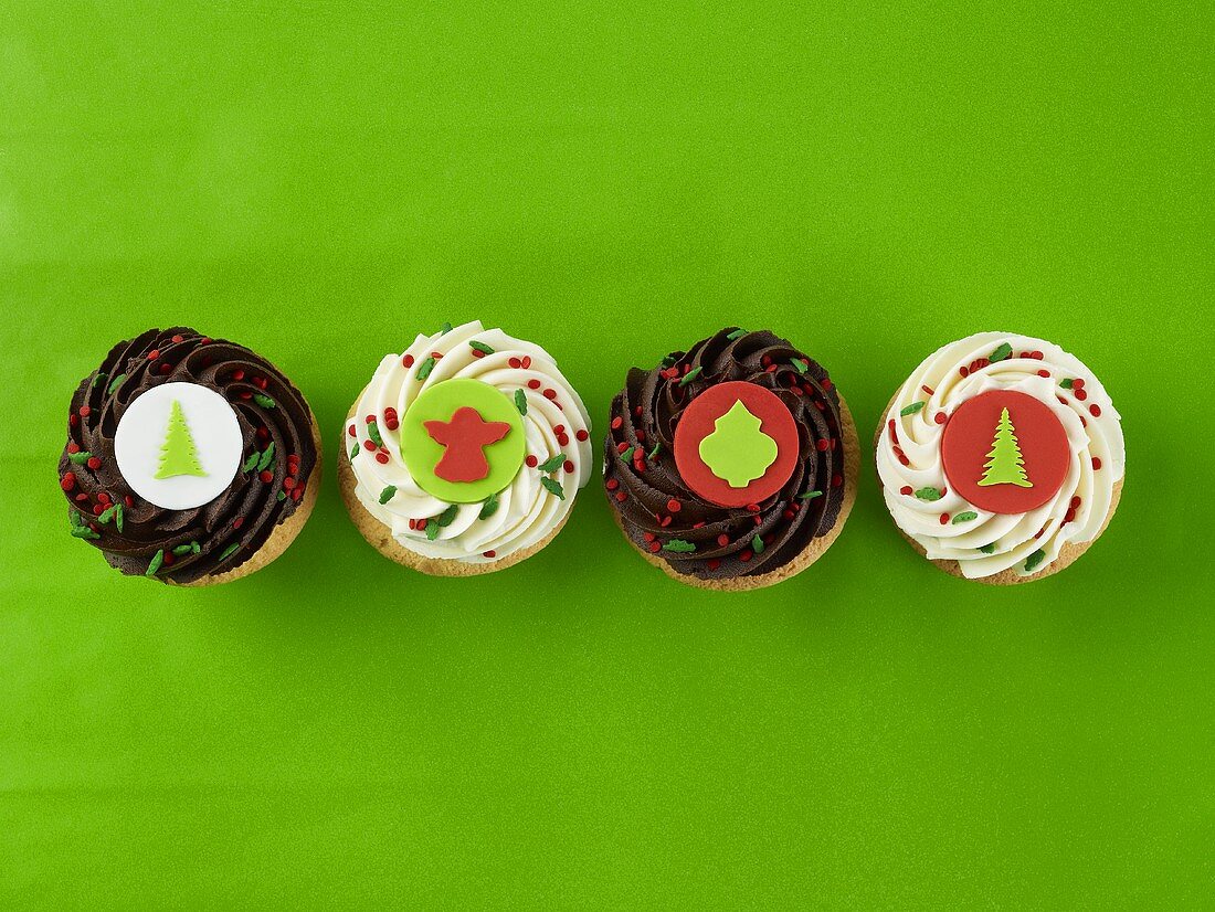 Four Christmas cupcakes