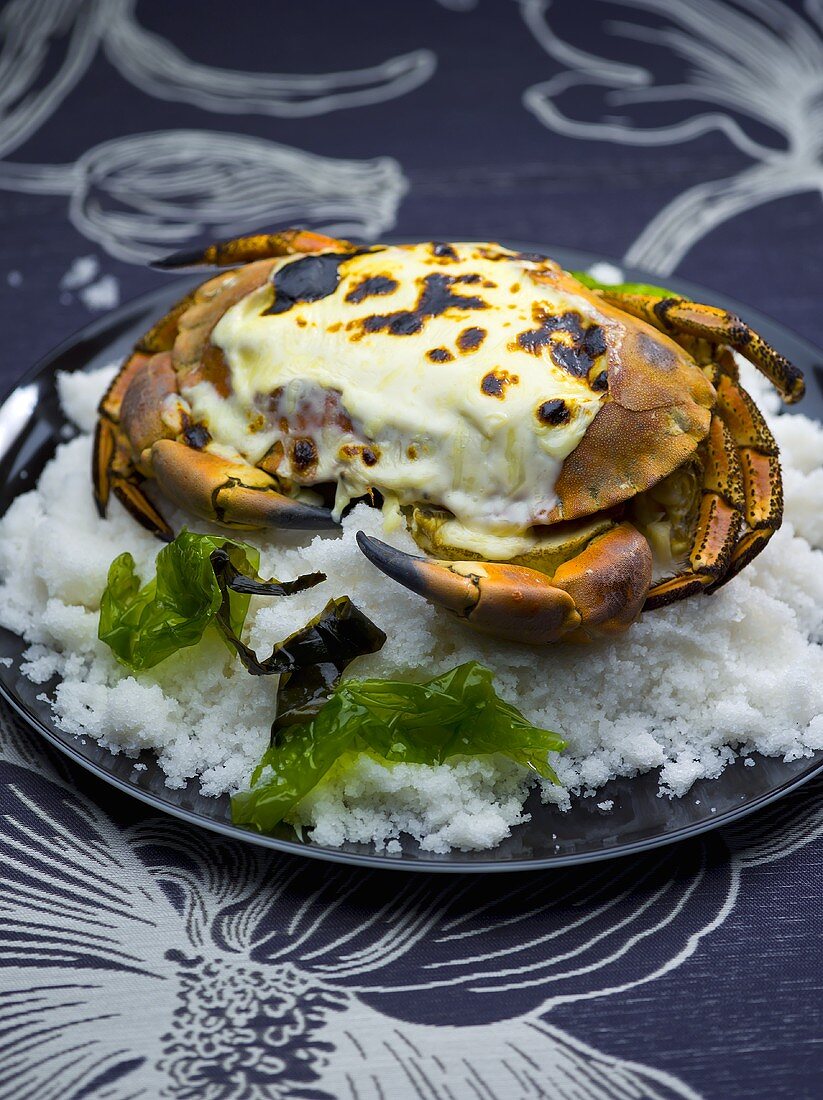 Grilled crab on a bed of salt