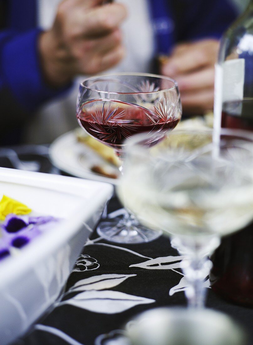Crystal wine glasses on a laid table
