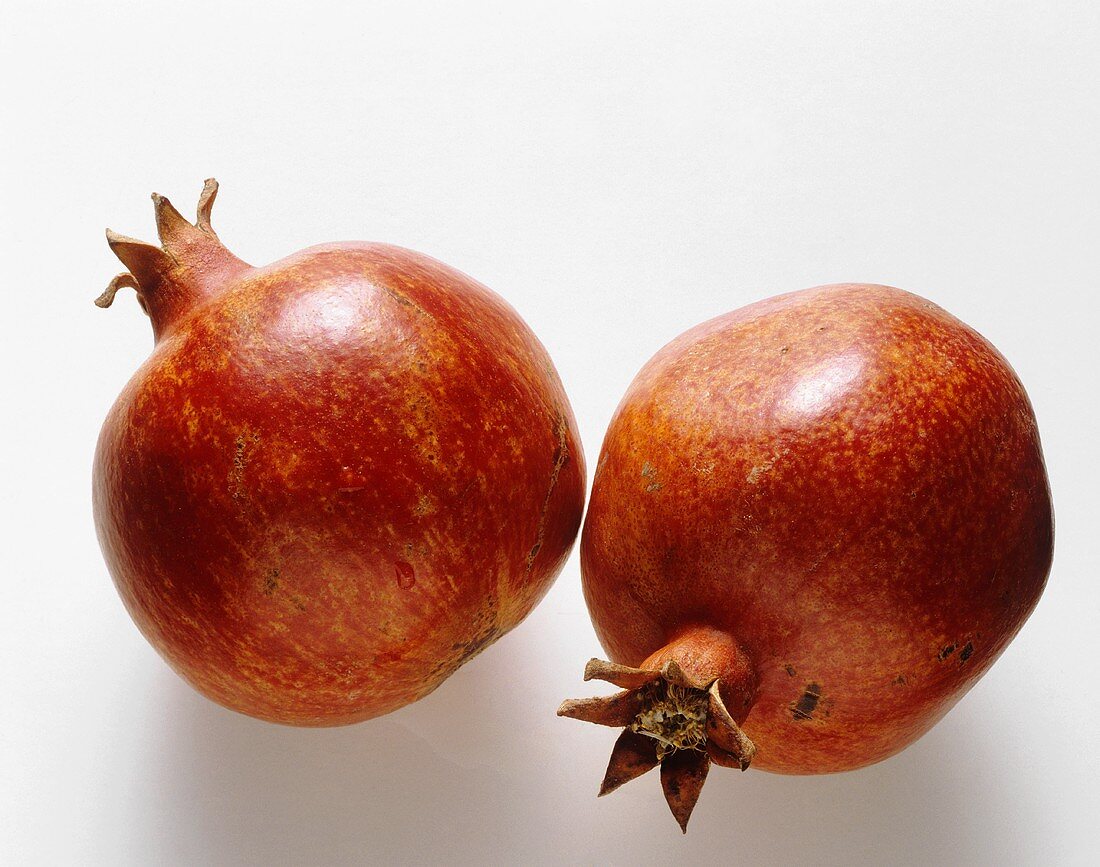 Two Whole Fresh Pomegranates