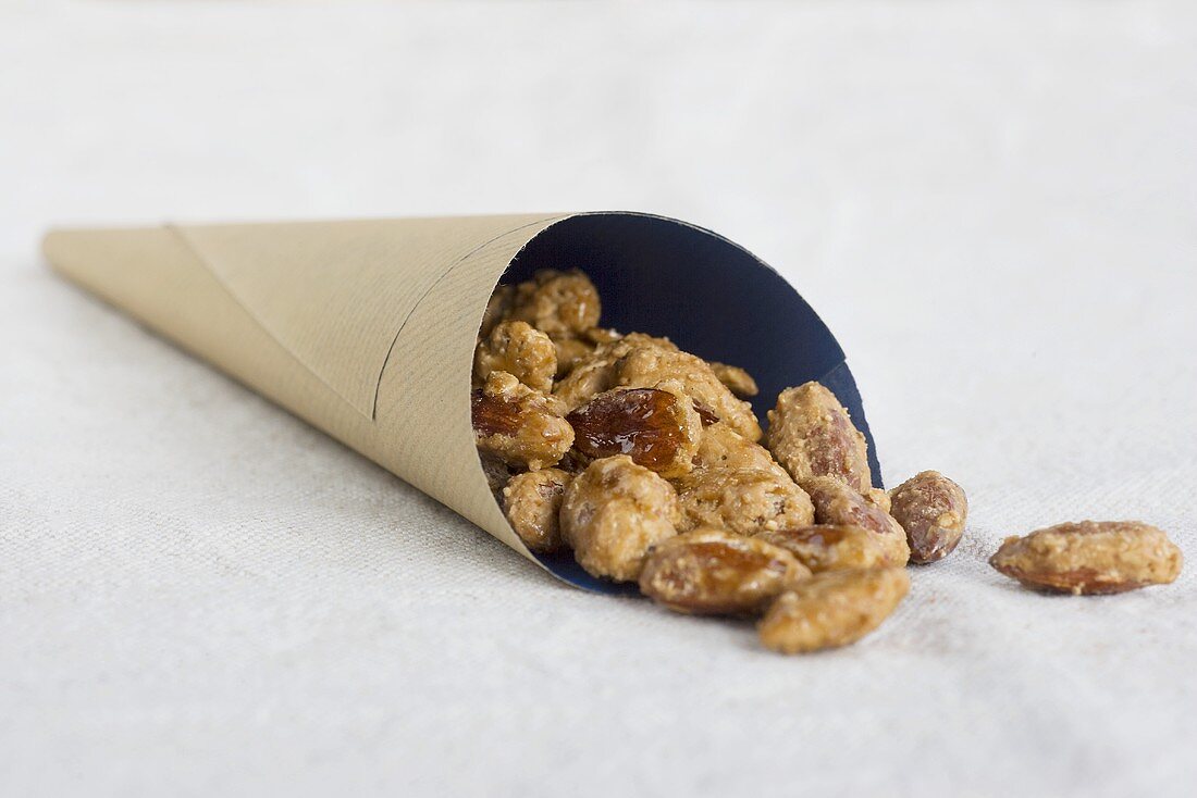 Roasted almonds in a paper cone