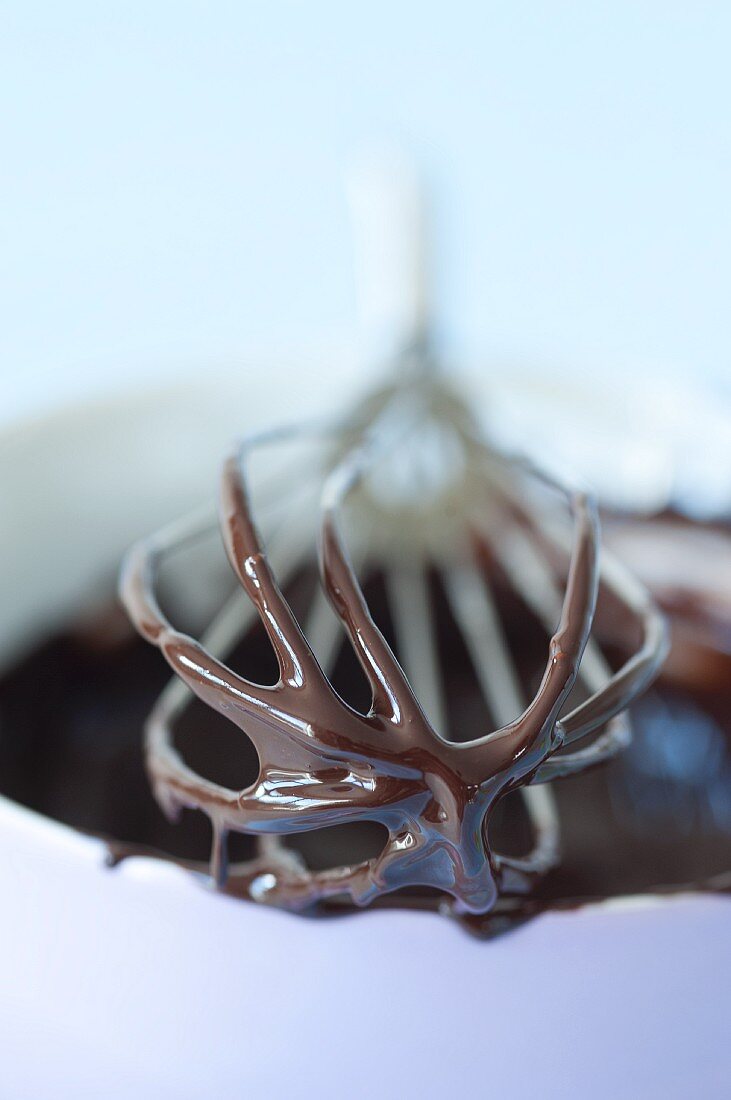 Melted chocolate on a whisk