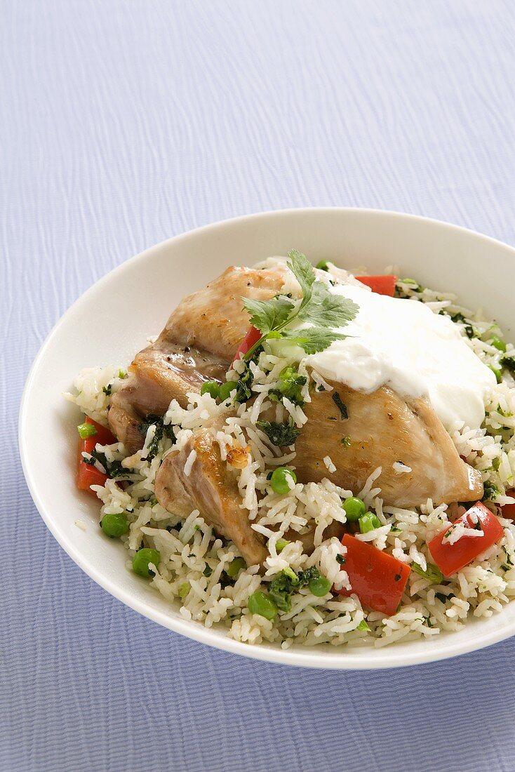 Pilau rice with chicken, spinach, peas and pepper