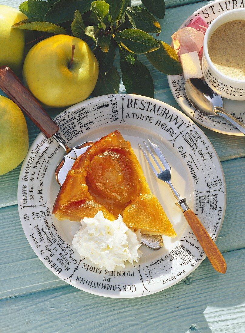 A piece of tarte tatin with cream