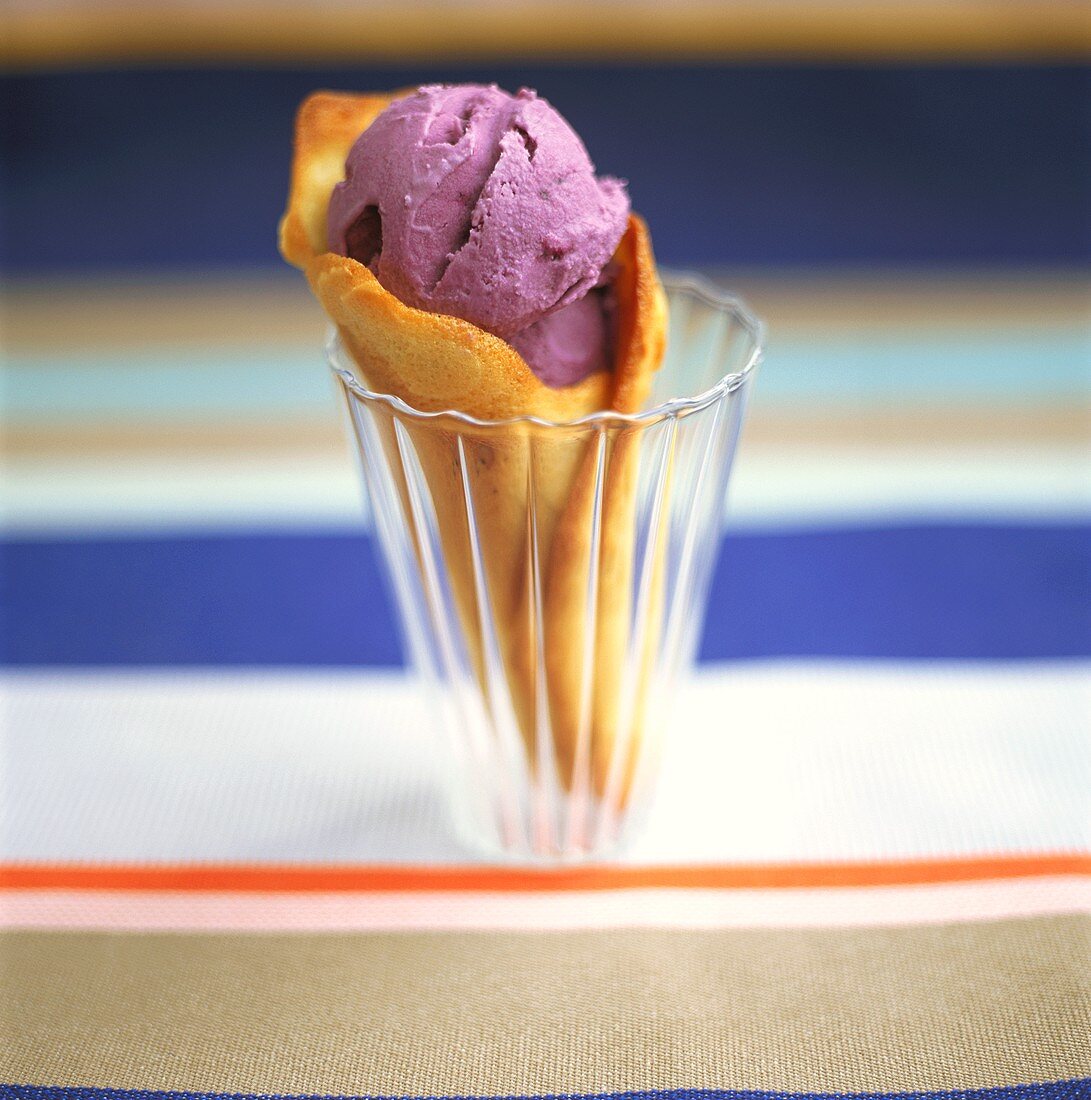 Blueberry ice cream in wafer cone