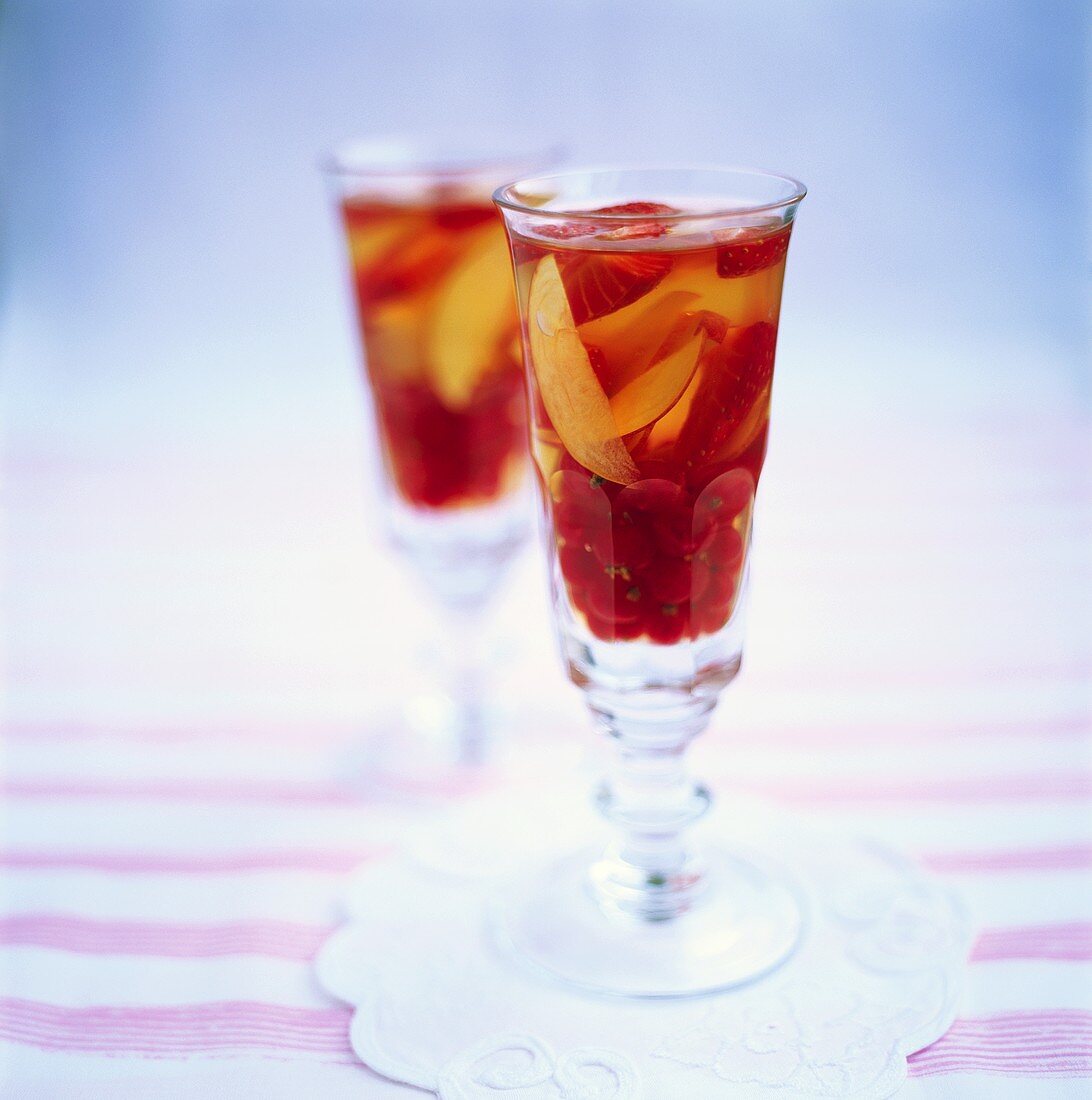 Jelly with berries and fruit in glasses