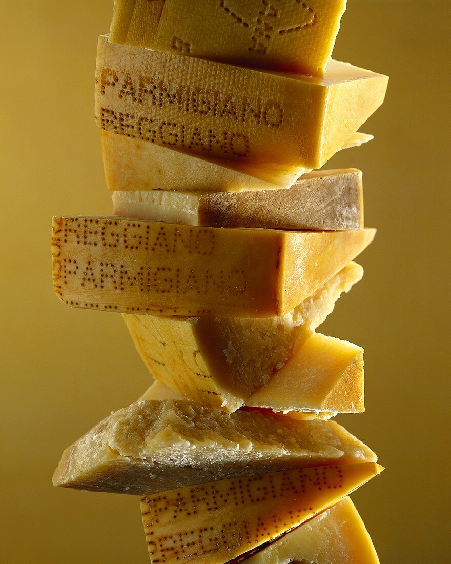 Chain of pieces of Parmesan at various stages of maturity