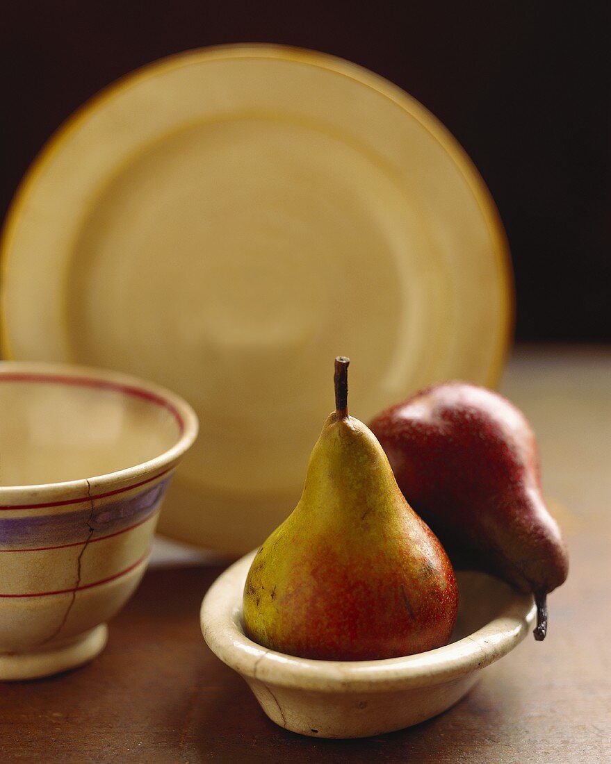 Two pears in wooden bowl