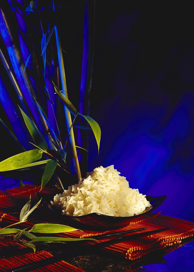 Bowl of rice and fresh bamboo