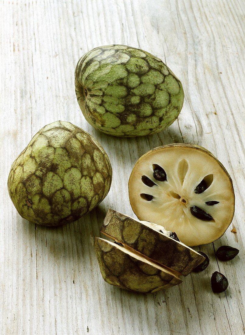 Cherimoyas (Annona cherimola) one with pieces cut off
