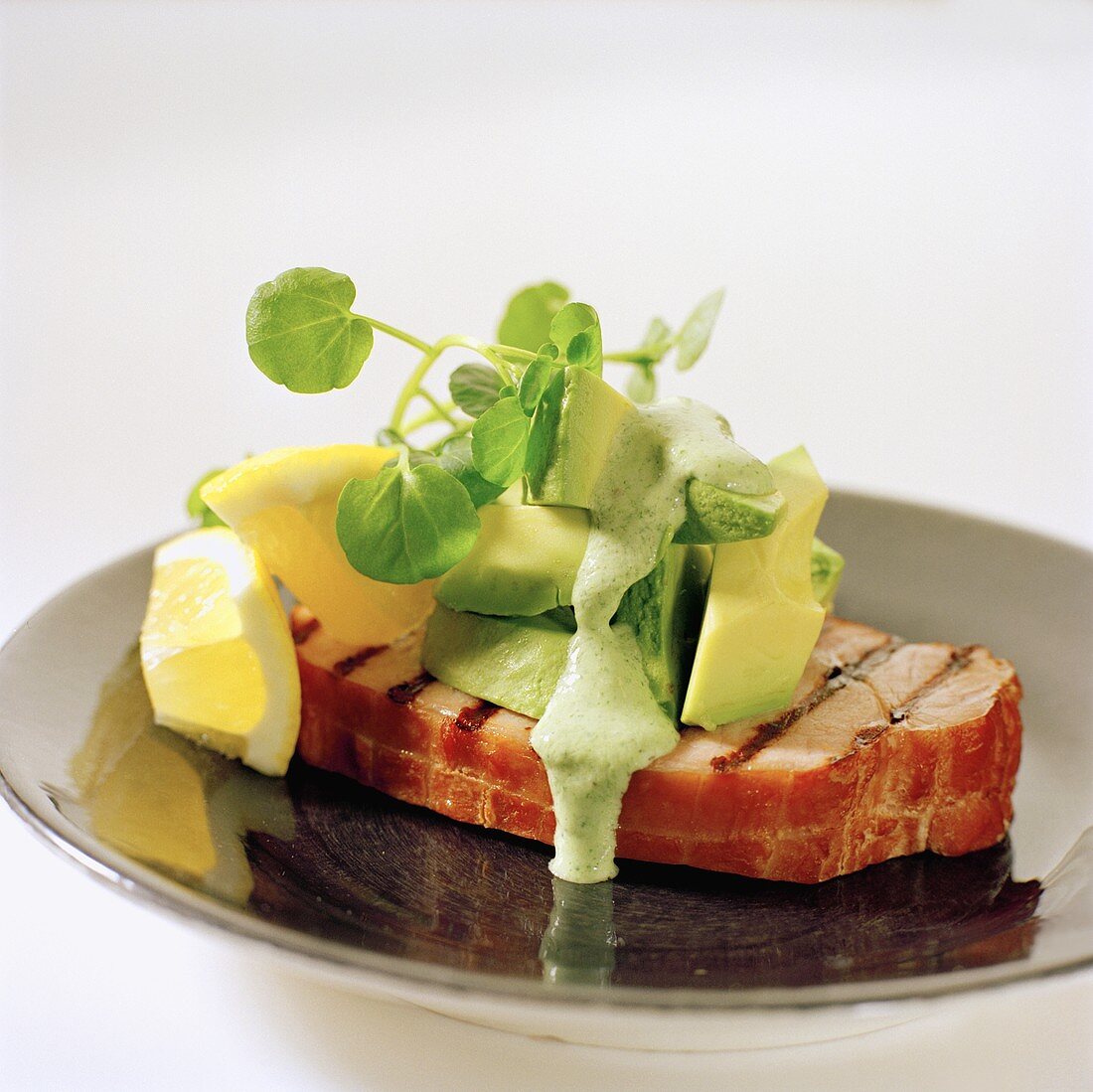 Smoked pickled loin of pork with avocado, cress and lemon