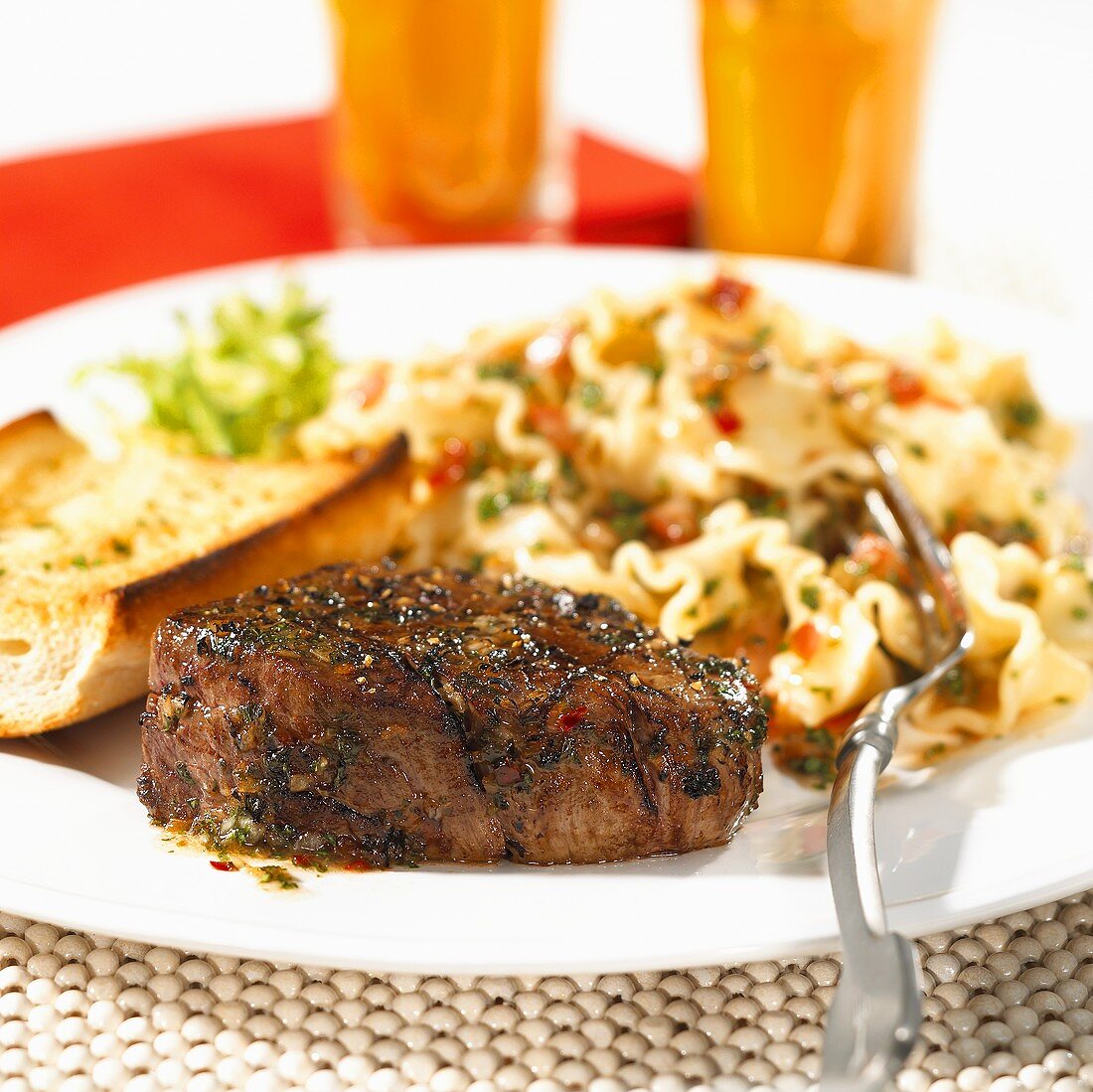 Grilled beef medallion with pasta salad