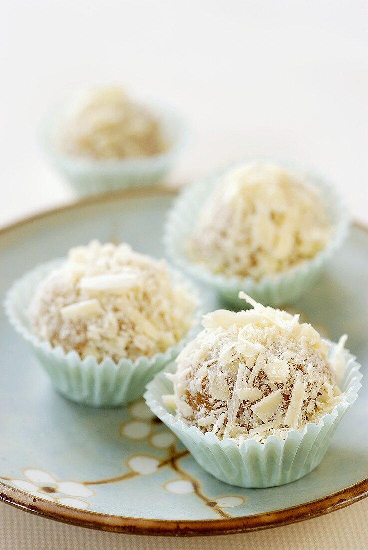 White chocolate truffles in petit four cases