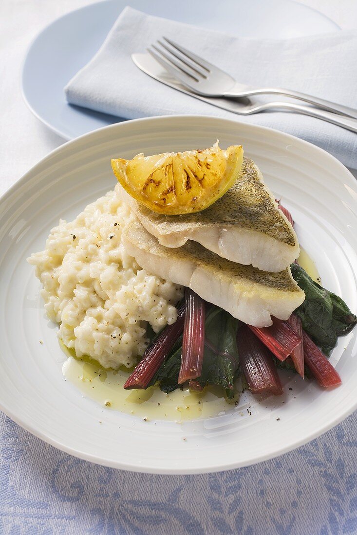 Sea bass fillets with red chard and risotto