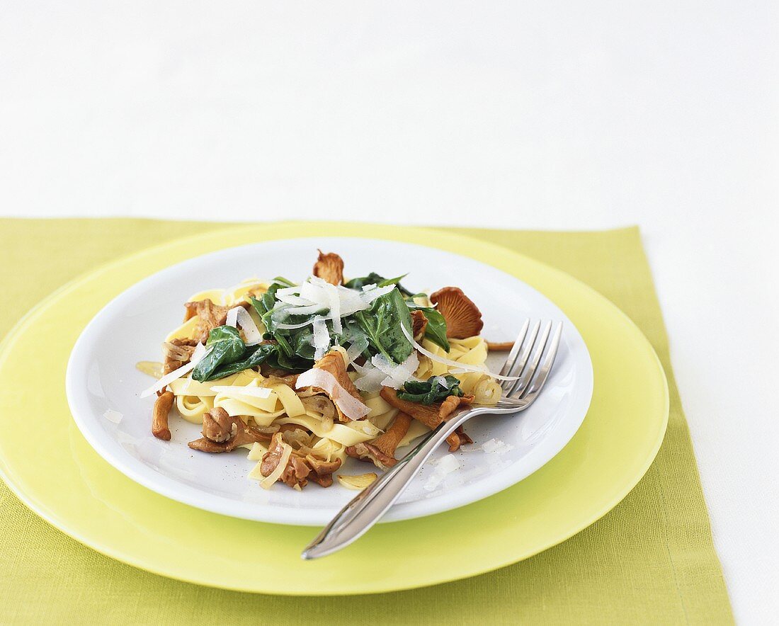 Ribbon pasta with chanterelles and spinach