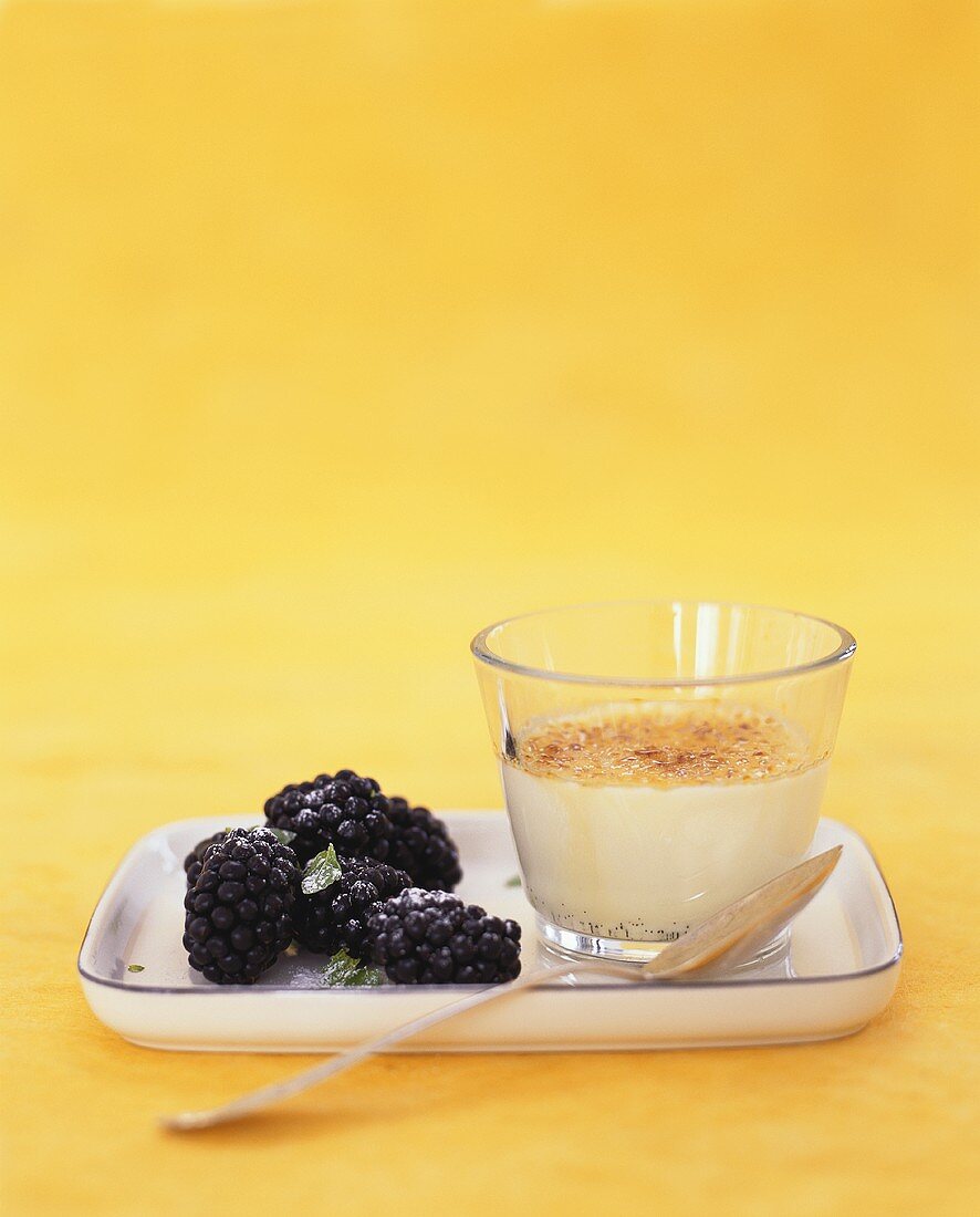 Vanilla and lemon cream with blackberries