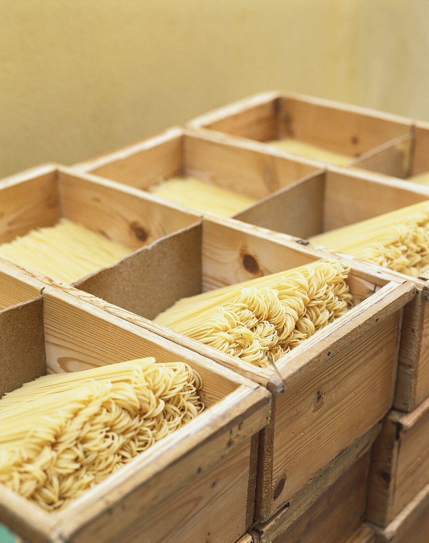Spaghetti in wooden boxes