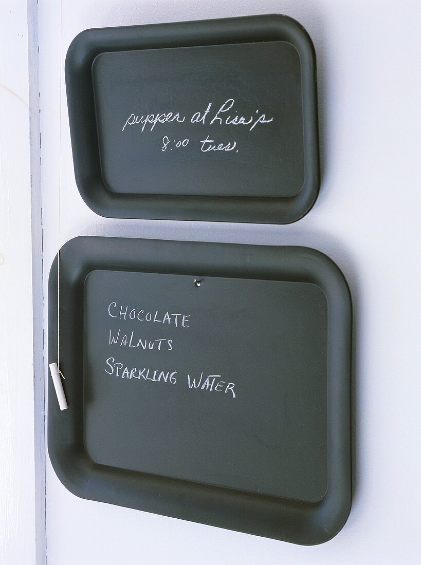 Two blackboards with chalk for kitchen notes