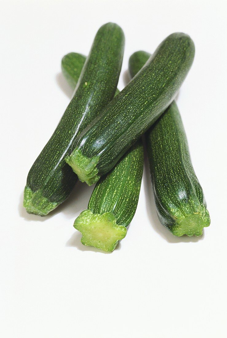 Four courgettes