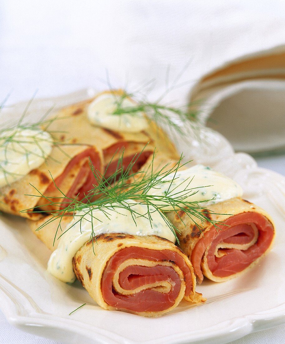 Crepe rolls with salmon filling