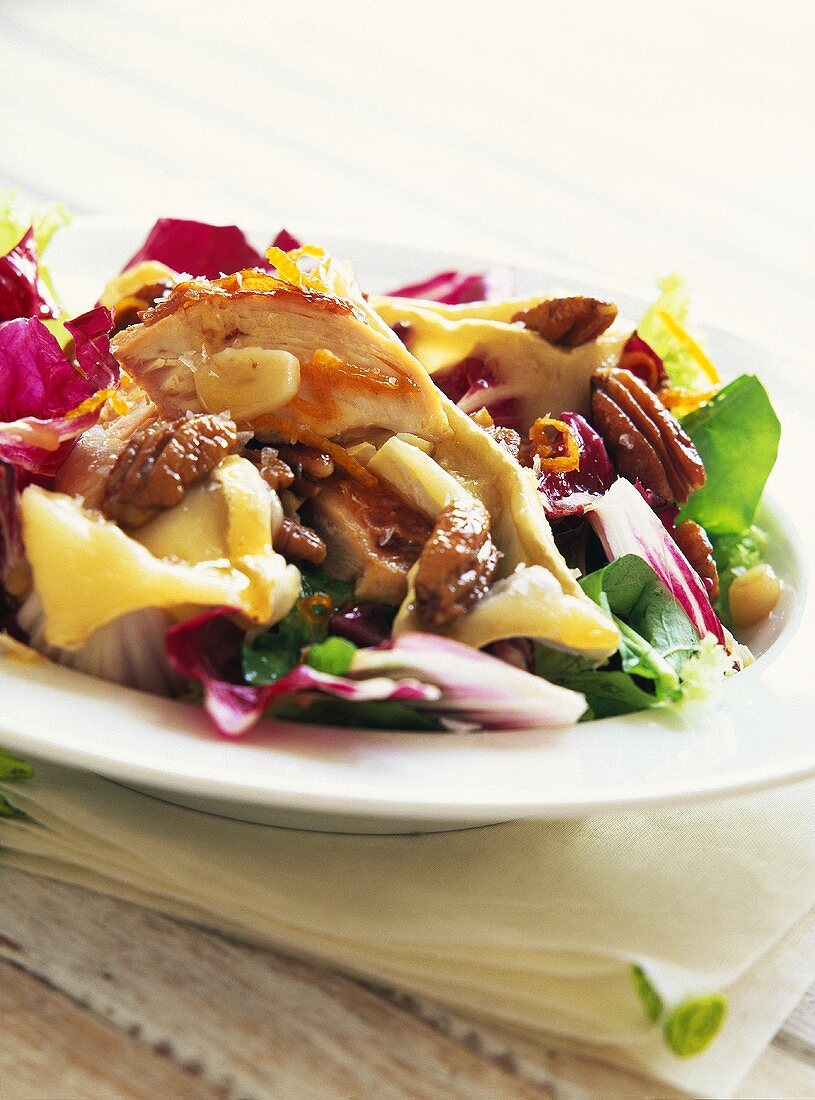 Chicken breast with salad leaves, banana and nuts