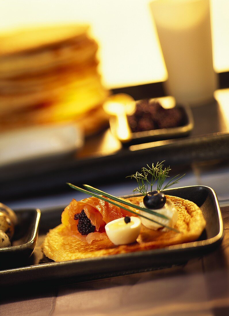 Blinis with smoked salmon, caviare and quail's egg