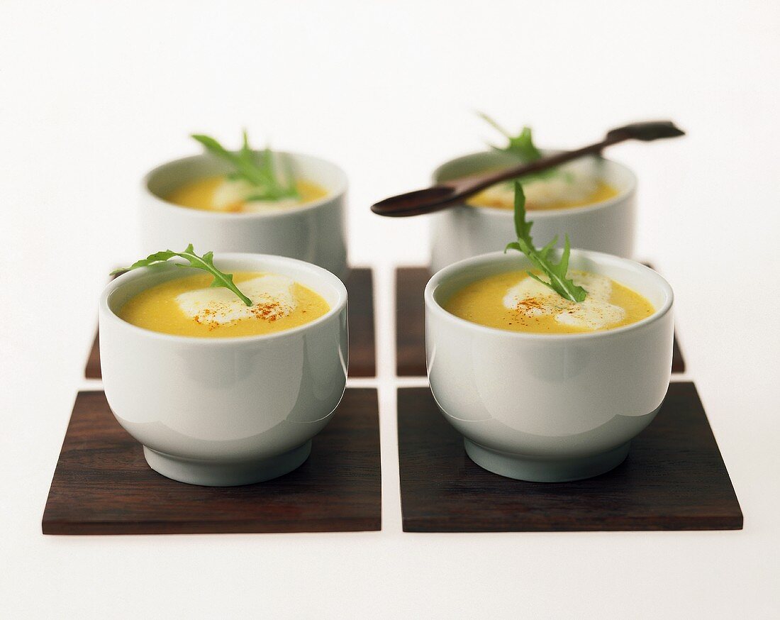 Gingered carrot soup with crème fraiche and rocket