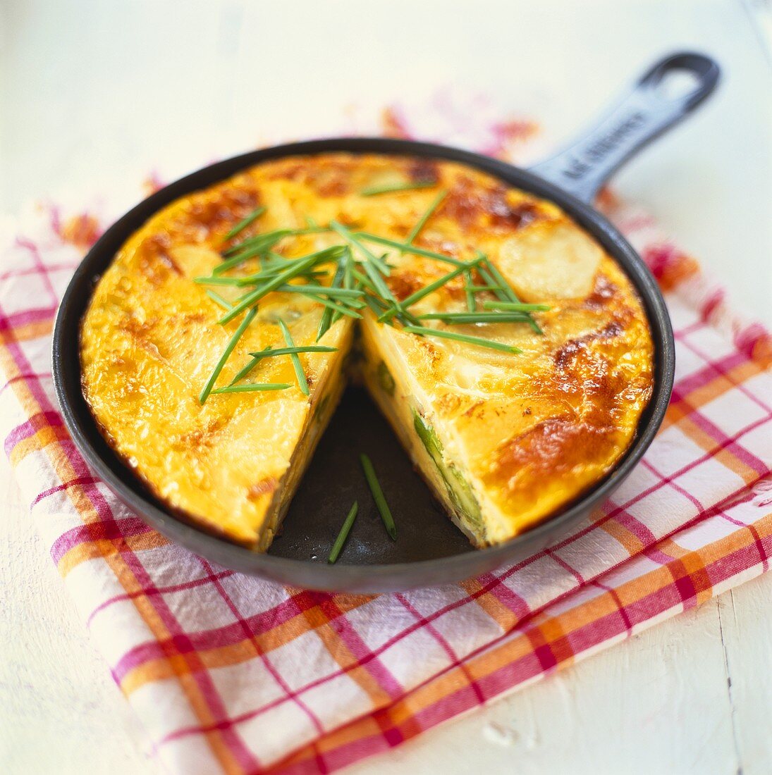 Asparagus frittata in frying pan