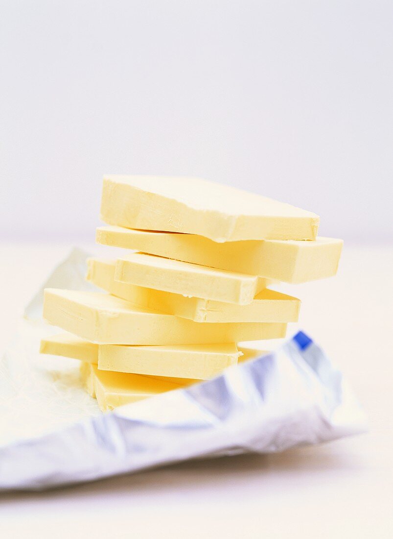 Slices of butter in a pile