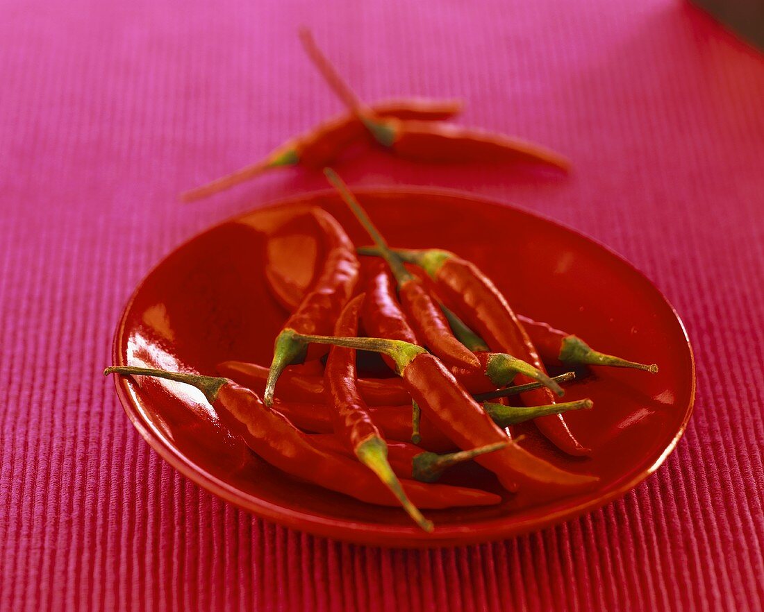 Chili peppers in red bowl