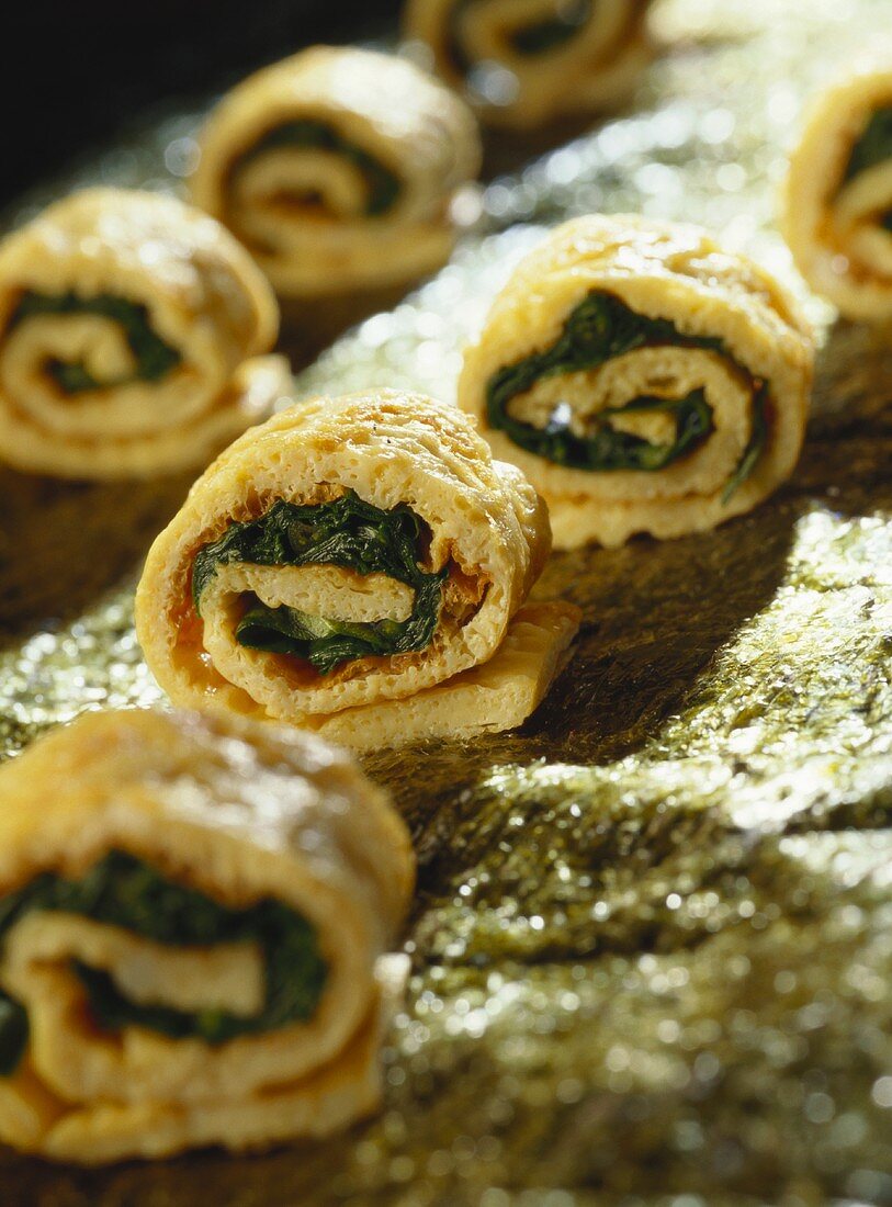 Pancake and spinach rolls