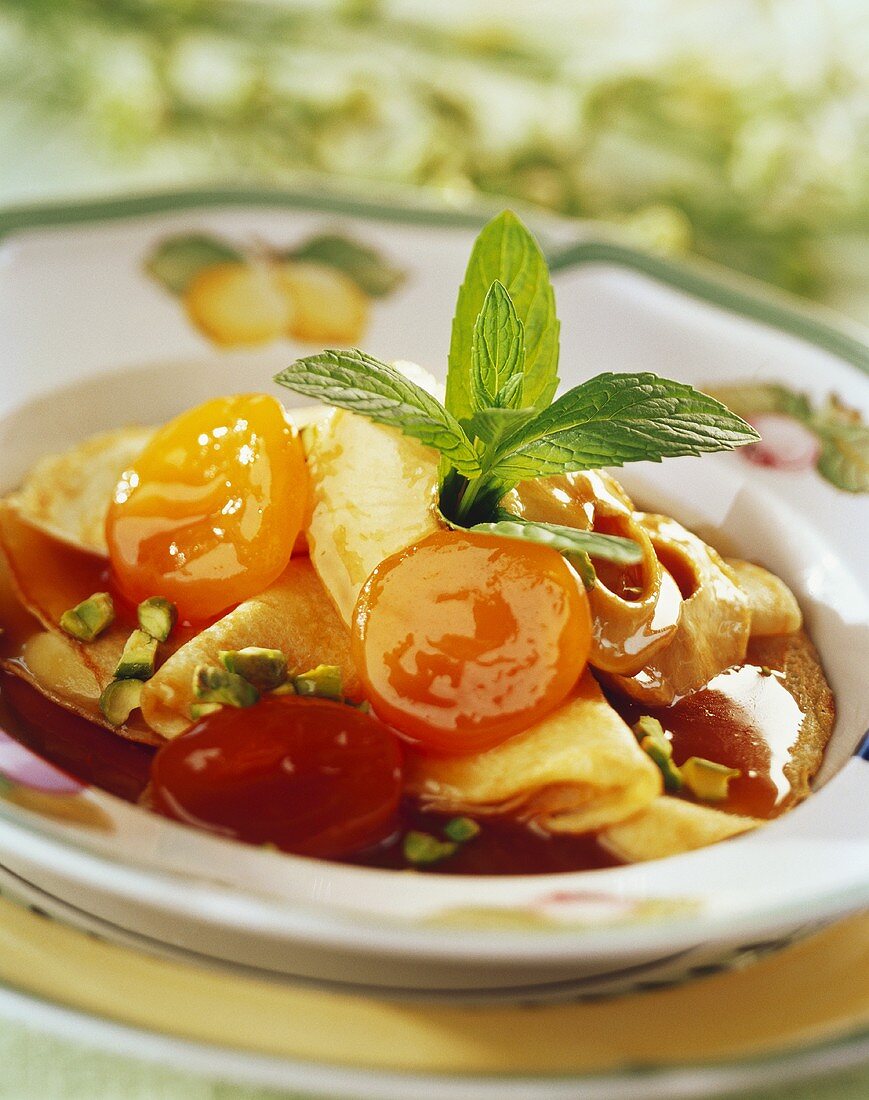 Crêpes with fruit and caramel sauce 