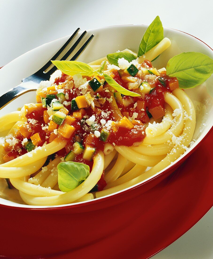 Macaroni with tomato and vegetable sauce