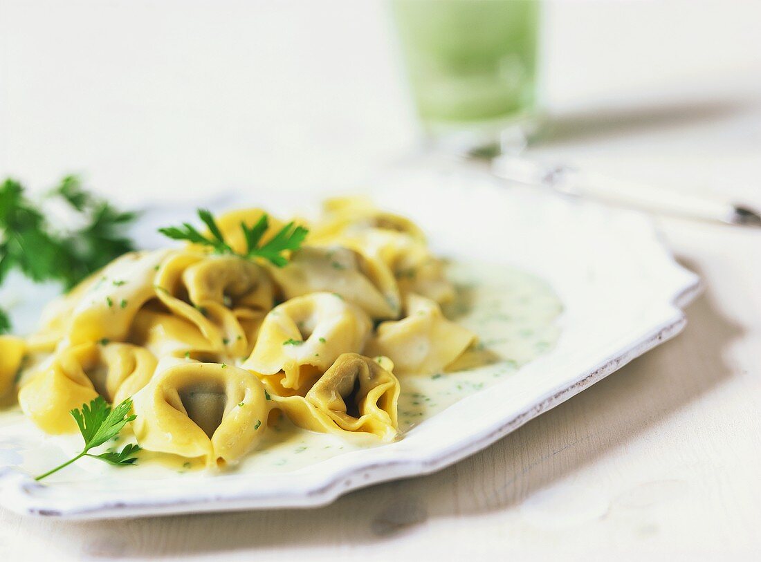 Tortellini with herb and cheese sauce