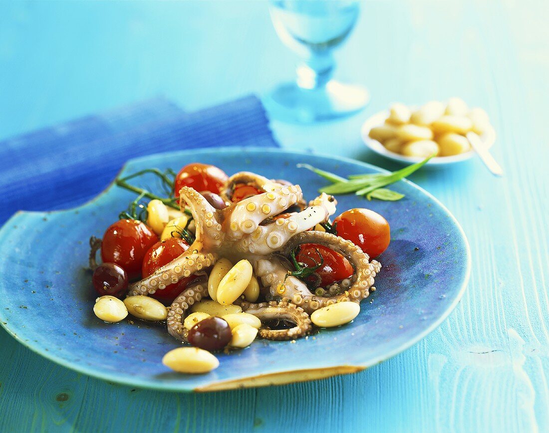 Octopus with broad beans and cherry tomatoes