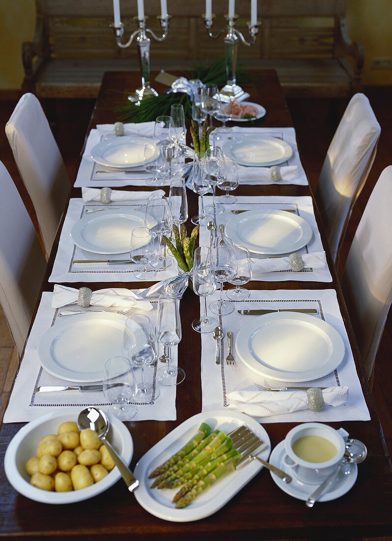 Table laid for asparagus meal
